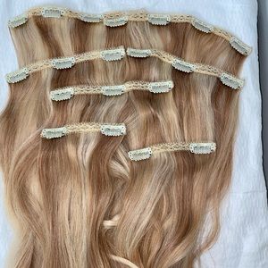 Bellami human hair clip-in hair blonde extensions.